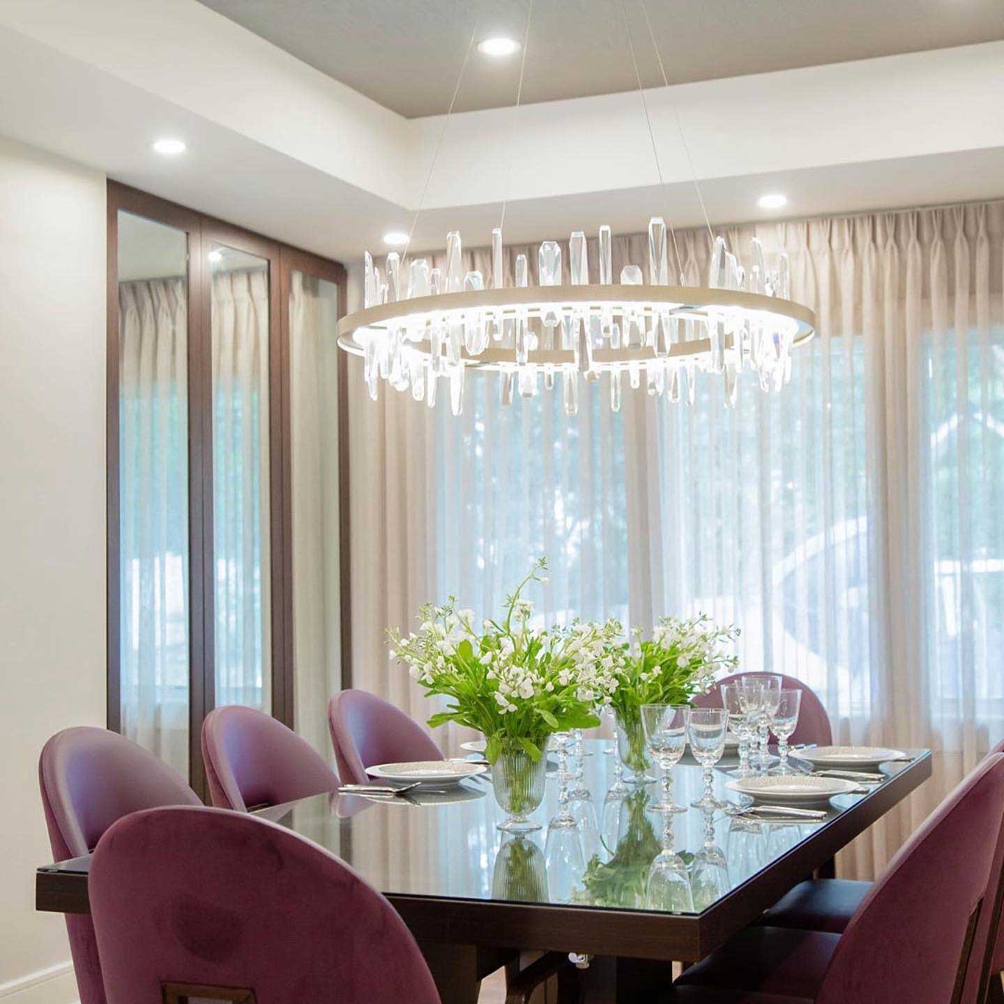 Solitude Circular LED Pendant Light in dining room.