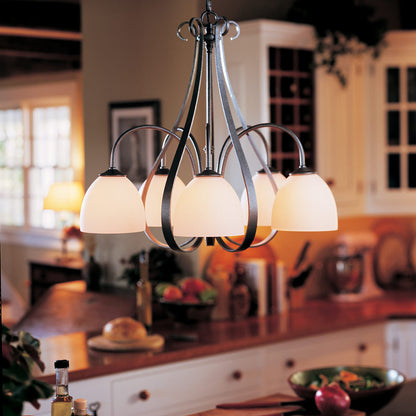 Sweeping Taper Chandelier in kitchen.