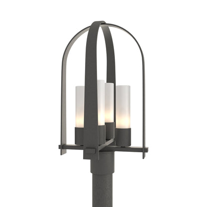 Triomphe Outdoor Post Light in Natural Iron/Opal Glass.