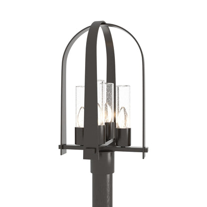 Triomphe Outdoor Post Light in Oil Rubbed Bronze/Seeded Clear Glass.