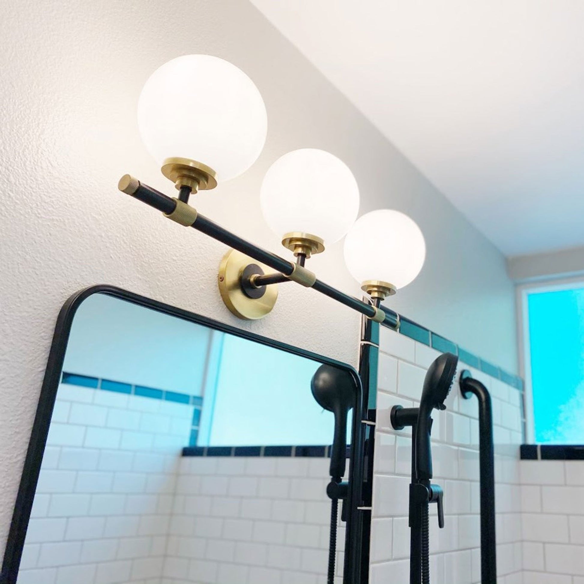 Bowery Bath Vanity Light in bathroom.