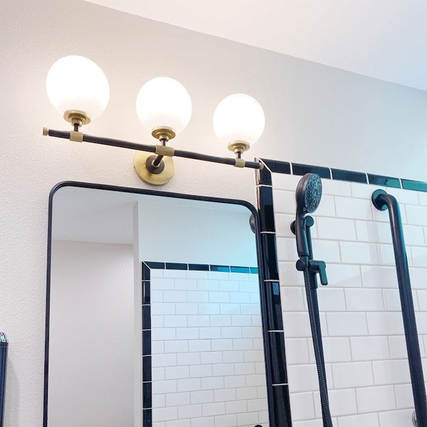 Bowery Bath Vanity Light in bathroom.