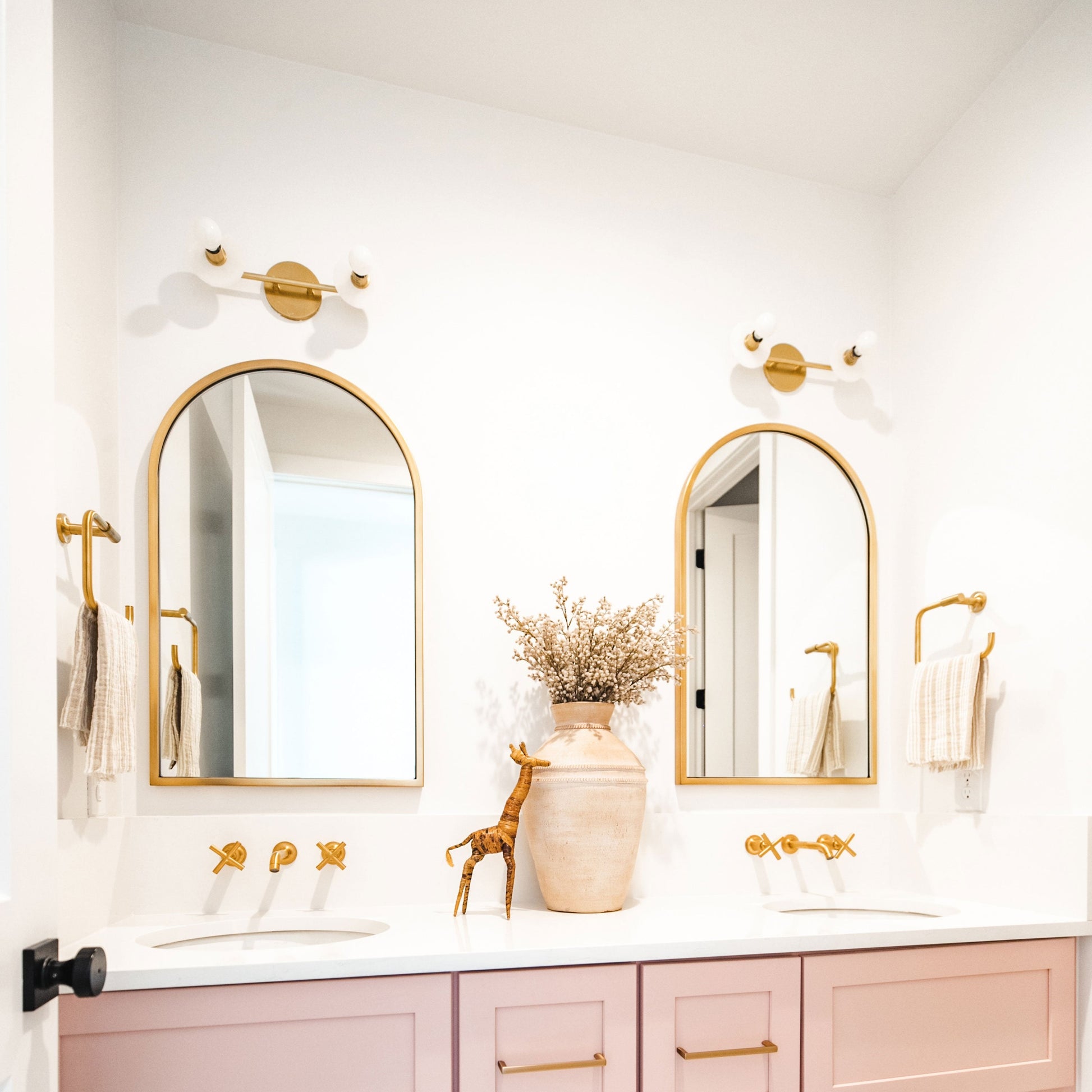 Elmont Bath Vanity Light in bathroom.