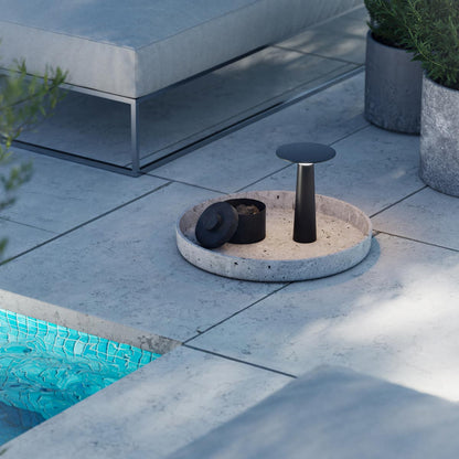 Lix Outdoor LED Portable Table Lamp in Outside Area.