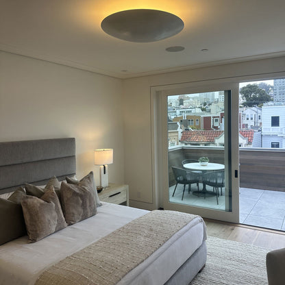 Moon Semi Flush Mount Ceiling Light in bedroom.