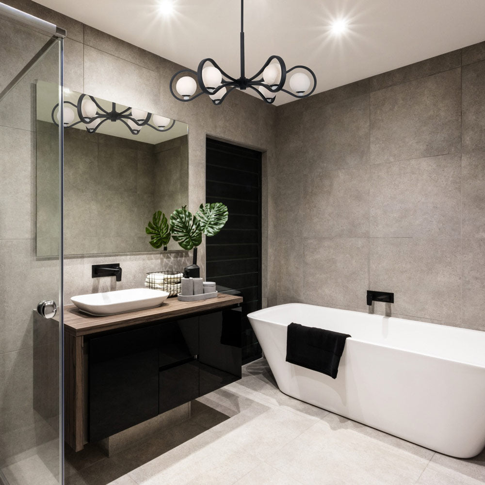 Elliptical Chandelier in bathroom.