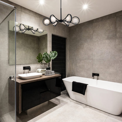 Elliptical Chandelier in bathroom.