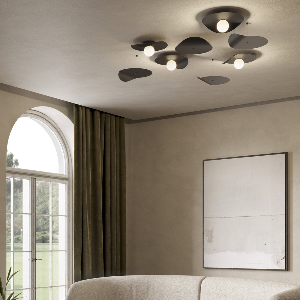 Flow Flush Mount Ceiling Light in living room.