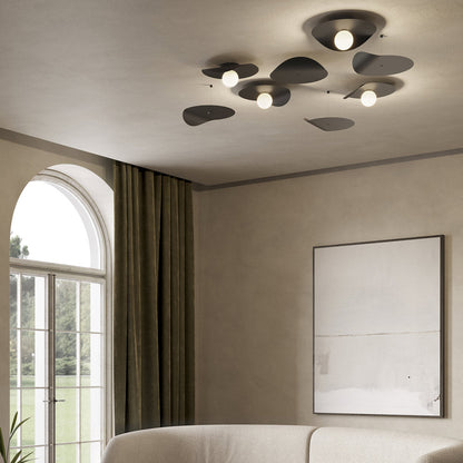 Flow Flush Mount Ceiling Light in living room.