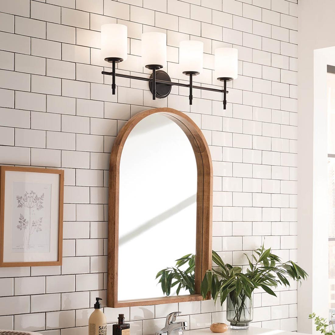 Ali Bath Vanity Light in bathroom.