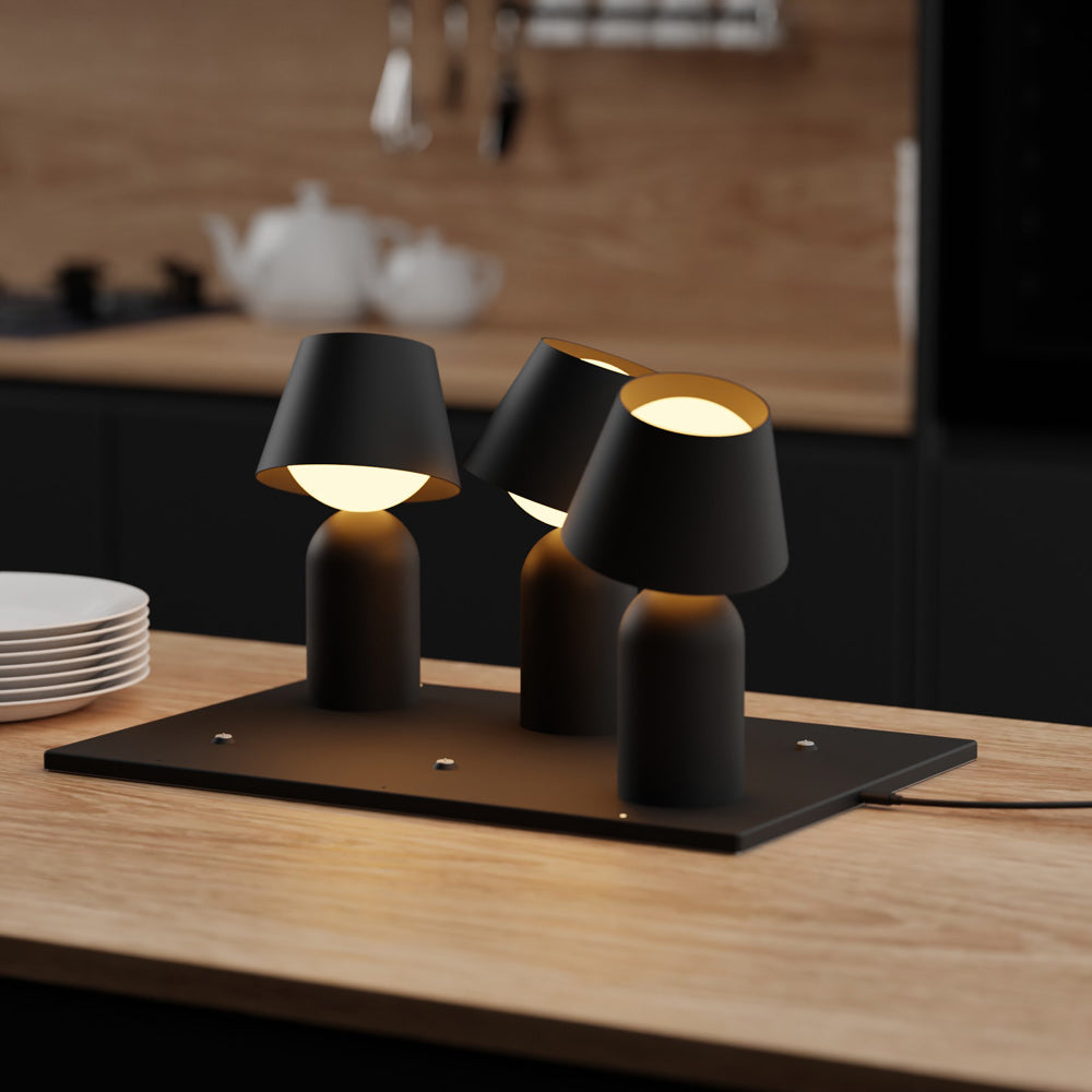 Guy Charging Mat in kitchen.