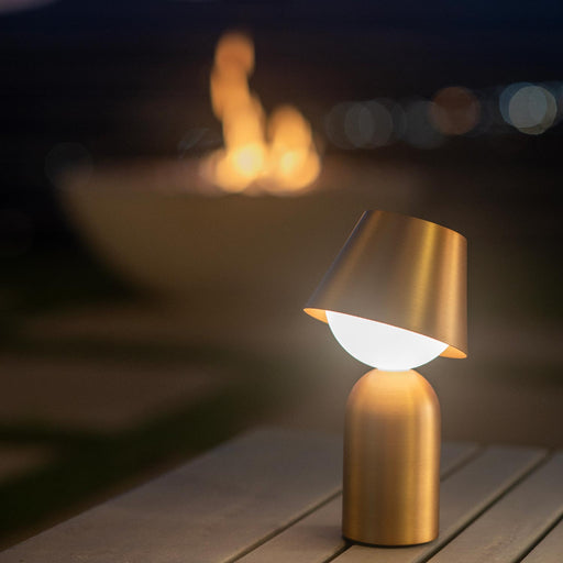 Guy Indoor/Outdoor LED Table Lamp in Outside Area.