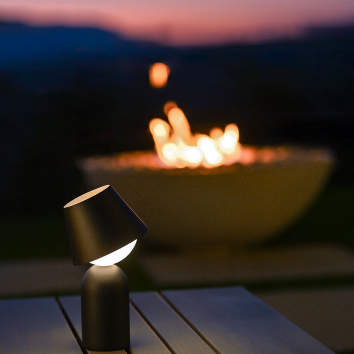 Guy Indoor/Outdoor LED Table Lamp in Outside Area.