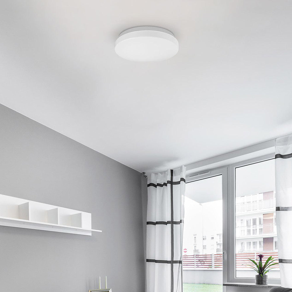 Collins LED Flush Mount Ceiling Light in living room.