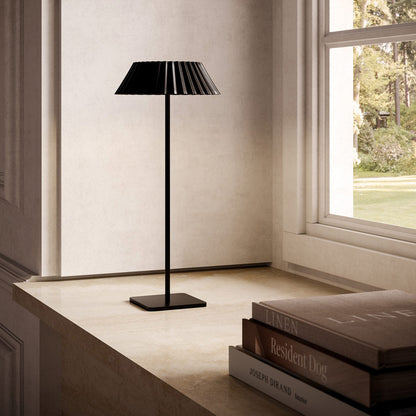 Pela LED Table Lamp in living room.