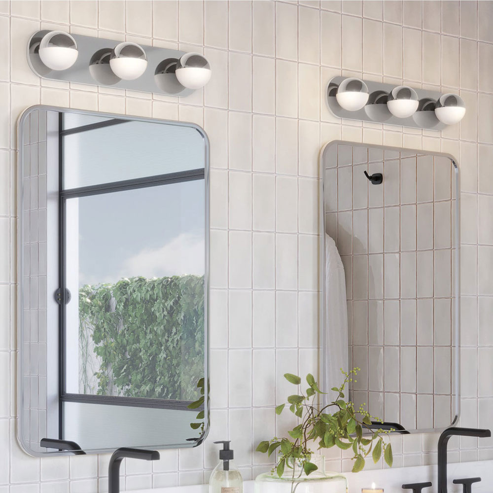 Pluto LED Vanity Wall Light in bathroom.