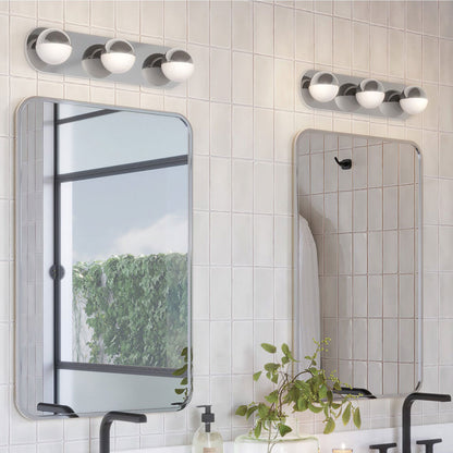 Pluto LED Vanity Wall Light in bathroom.