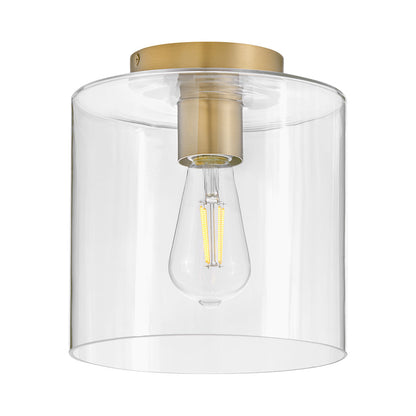 Pippa Round Flush Mount Ceiling Light in Lacquered Brass.