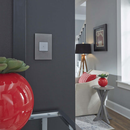 adorne® Cast Metals PLUS 1-Gang Wall Plate in living room.