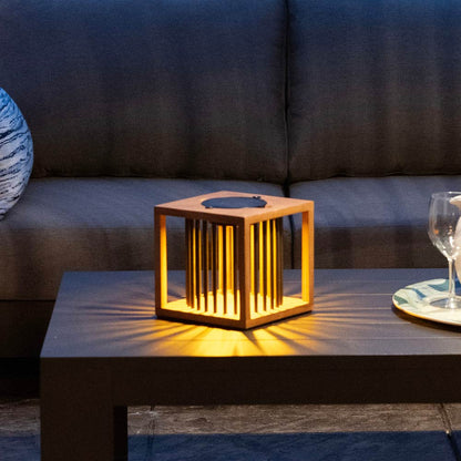 Akin Outdoor Solar LED Table Lamp in Outside Area.