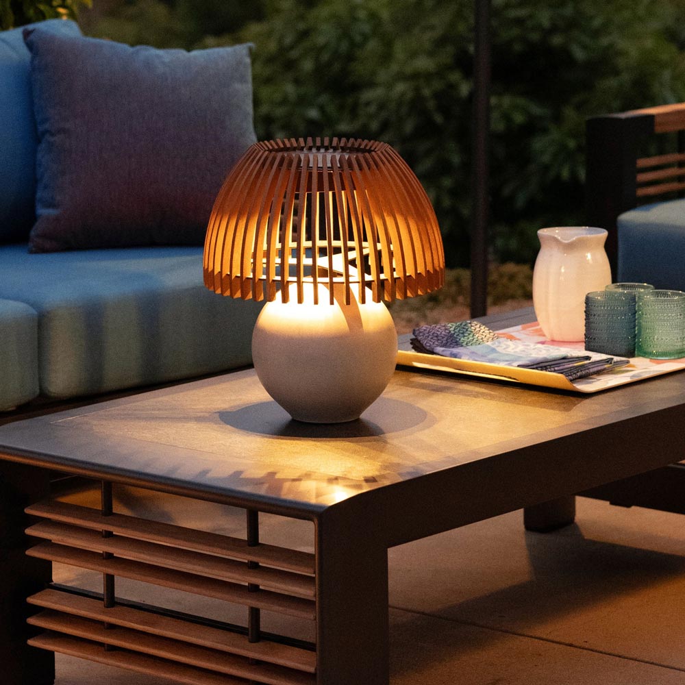 Alba Outdoor Solar LED Table Lamp in Outside Area.