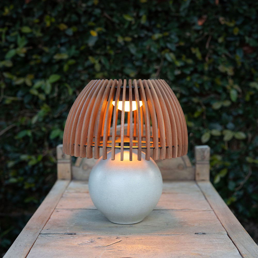 Alba Outdoor Solar LED Table Lamp in Outside Area.