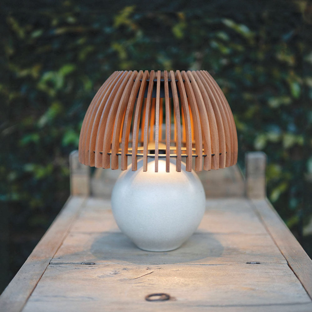 Alba Outdoor Solar LED Table Lamp in Outside Area.