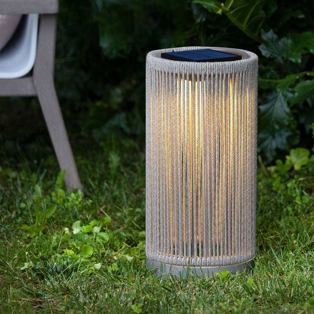 Alto Outdoor Solar LED Lantern in Outside Area.