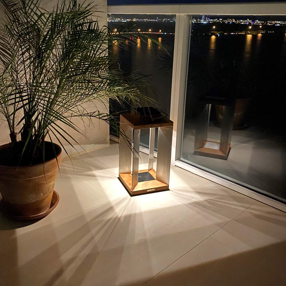 Blade Outdoor Solar LED Lantern in Outside Area.