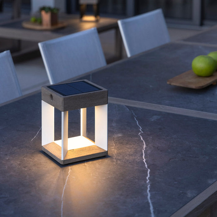 Blade Outdoor Solar LED Table Lamp in Outside Area.