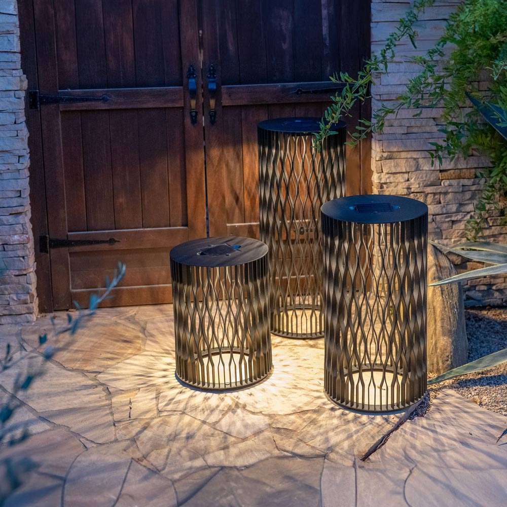 Dala Outdoor Solar LED Lantern in Outside Area.