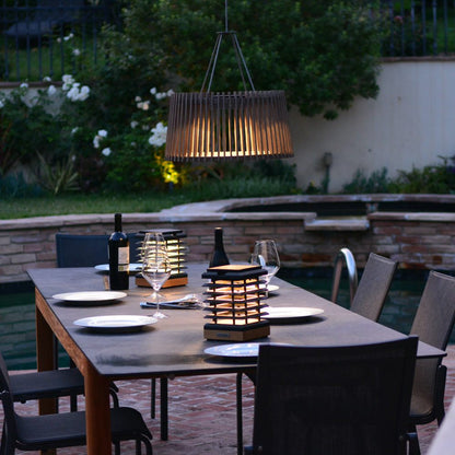 Muse Pendulum Outdoor Solar LED Pendant Light in Outside Area.