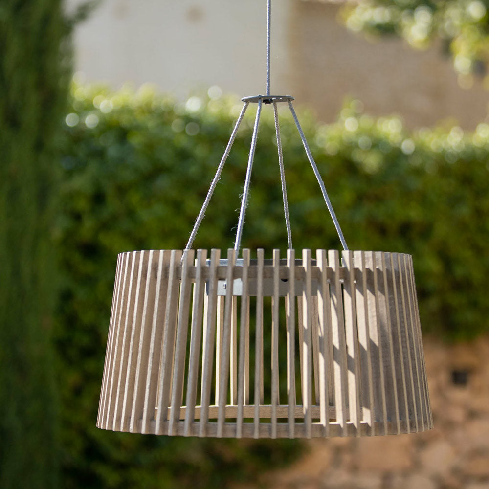 Muse Pendulum Outdoor Solar LED Pendant Light in Outside Area.