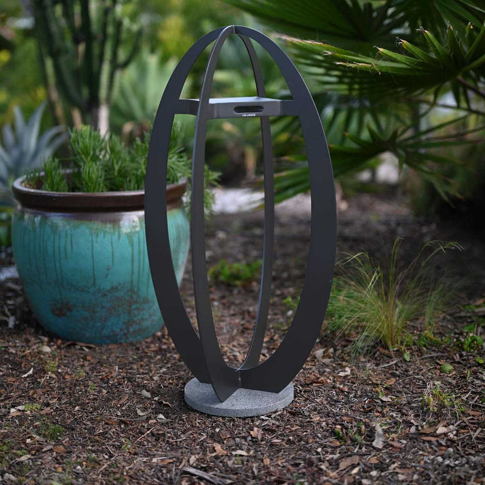 Oval Outdoor Solar LED Floor Lamp in Outside Area.