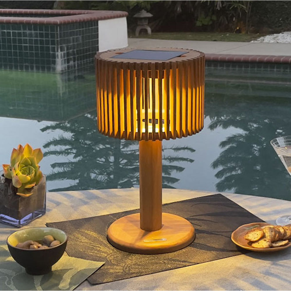 Pixy Outdoor Solar LED Table Lamp in Outside Area.