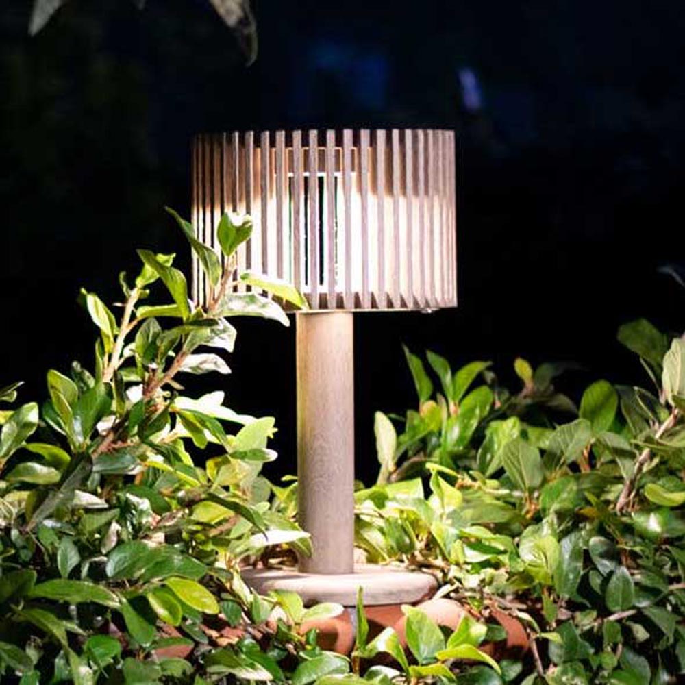 Pixy Outdoor Solar LED Table Lamp in Outside Area.