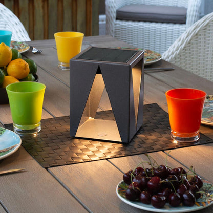 Teatree Outdoor Solar LED Table Lamp in Outside Area.