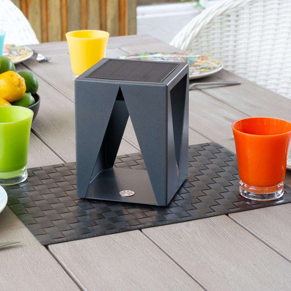 Teatree Outdoor Solar LED Table Lamp in Outside Area.