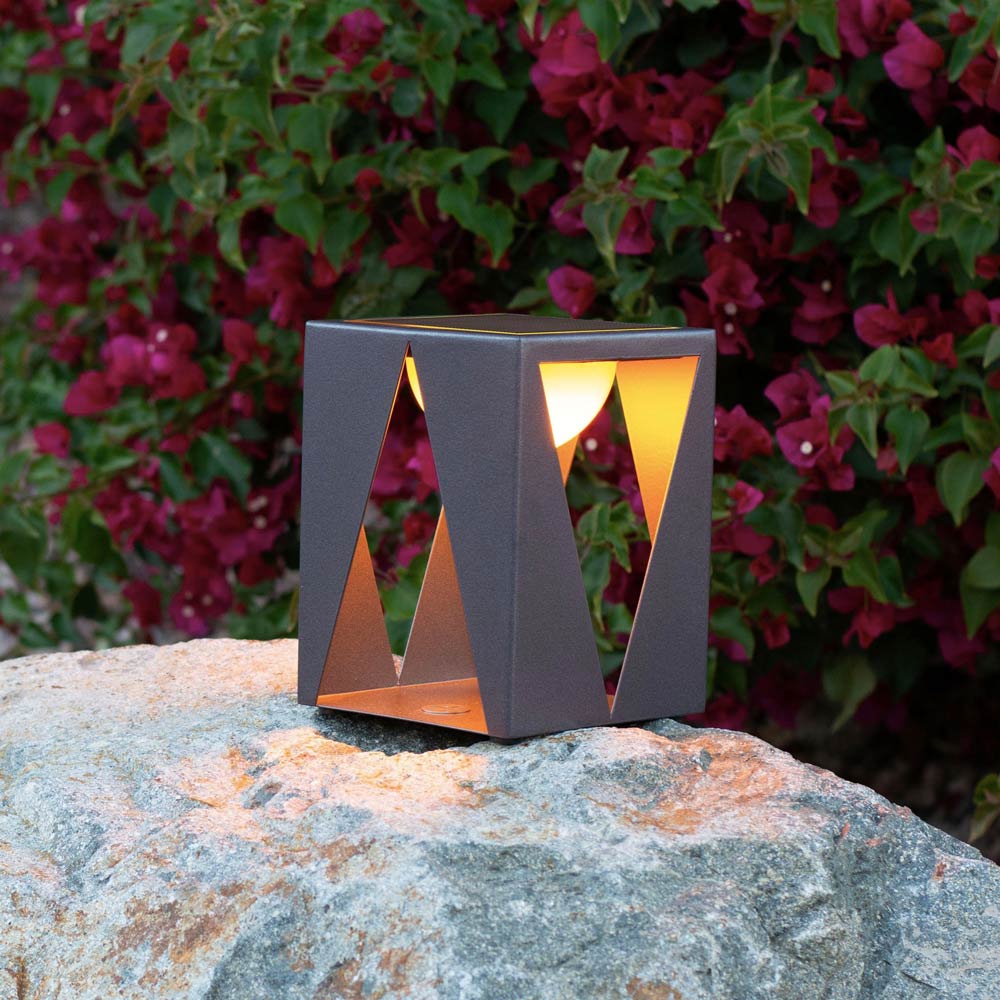 Teatree Outdoor Solar LED Table Lamp in Outside Area.