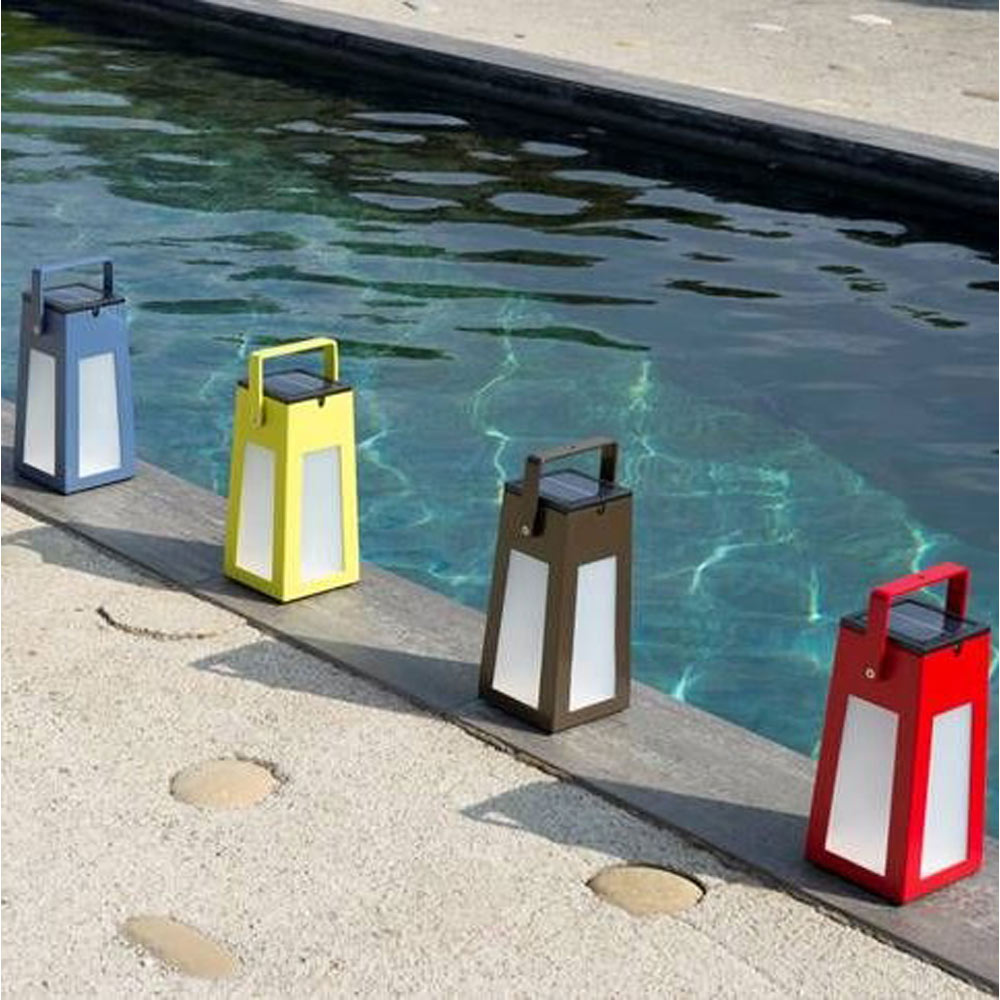 Tinka Outdoor Solar LED Lantern in Outside Area.