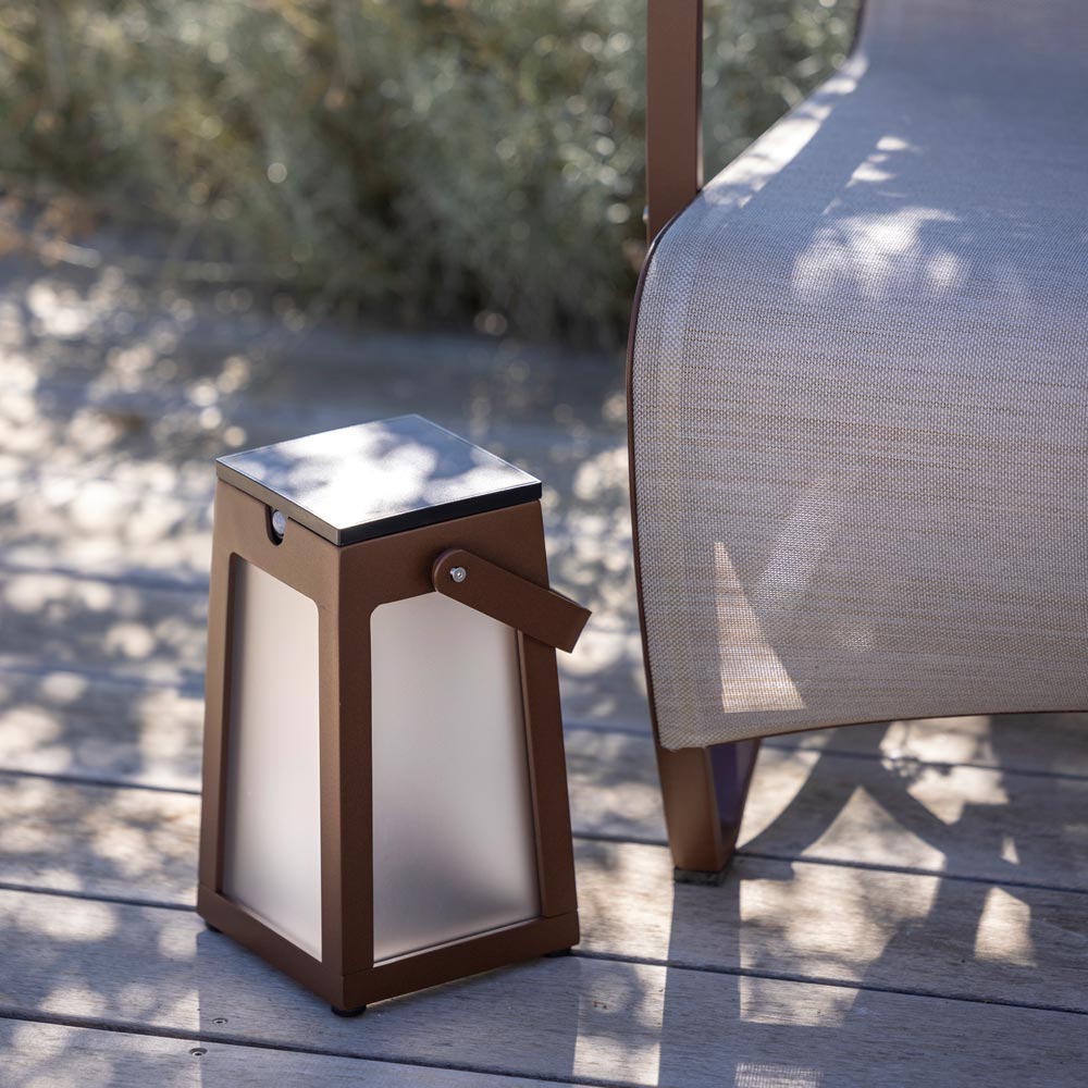 Tinka Outdoor Solar LED Lantern in Outside Area.