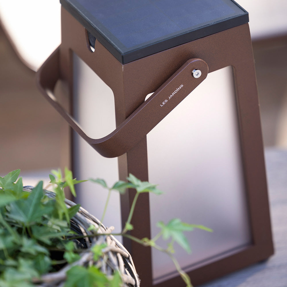 Tinka Outdoor Solar LED Lantern in Outside Area.