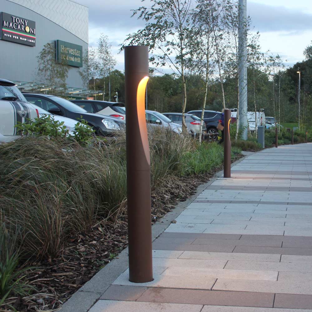 Flindt Garden Tall Outdoor LED Bollard in Outside Area.