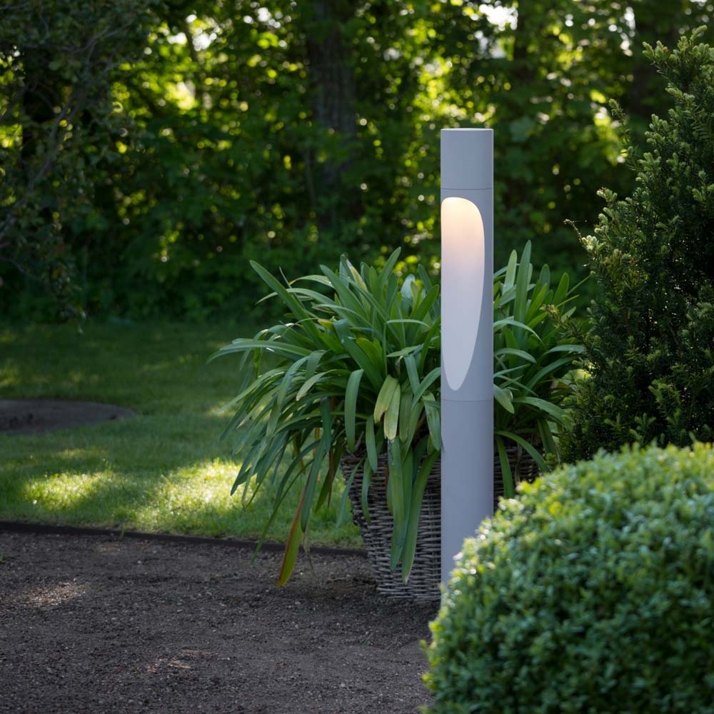 Flindt Garden Tall Outdoor LED Bollard in Outside Area.