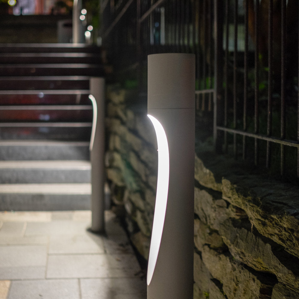Flindt Garden Tall Outdoor LED Bollard in Outside Area.
