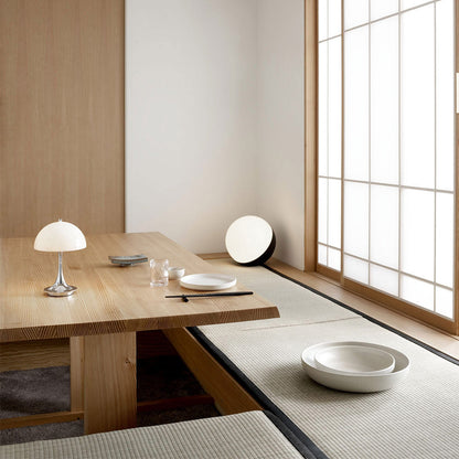 Panthella 160 LED Rechargeable Table Lamp in dining room.