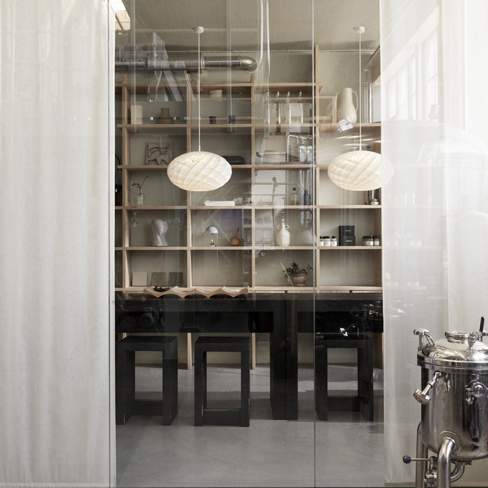 Patera Oval Pendant Light in living room.