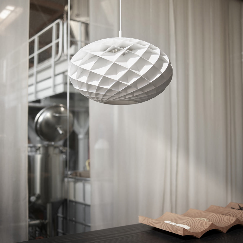 Patera Oval Pendant Light in living room.