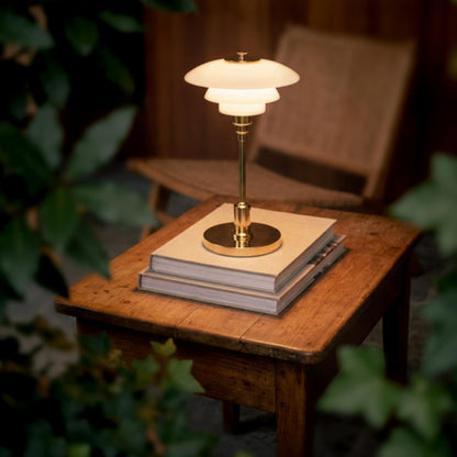 PH 1/1 LED Rechargeable Table Lamp in Outside Area.