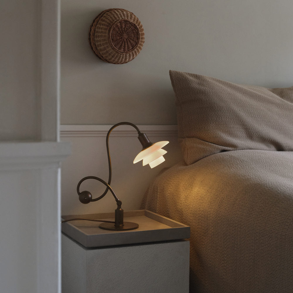 PH 1/1 Piano Table Lamp in bedroom.